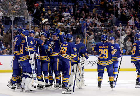 Mar 23, 2022; Buffalo, New York, USA; The Buffalo Sabres celebrate a win over the Pittsburgh Penguins at KeyBank Center. Mandatory Credit: Timothy T. Ludwig-USA TODAY Sports