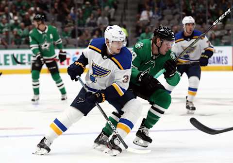 DALLAS, TEXAS – SEPTEMBER 16: Klim Kostin #37 of the St. Louis Blues and Rhett Gardner #49 of the Dallas Stars during a NHL preseason game at American Airlines Center on September 16, 2019 in Dallas, Texas. (Photo by Ronald Martinez/Getty Images)