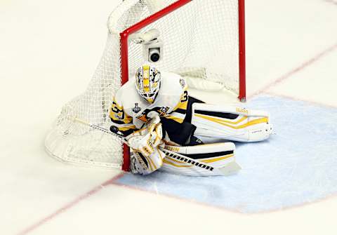 Jun 11, 2017; Nashville, TN, USA; Pittsburgh Penguins goalie Matt Murray (30) makes a save against Nashville Predators during the second period in game six of the 2017 Stanley Cup Final at Bridgestone Arena. Mandatory Credit: Aaron Doster-USA TODAY Sports