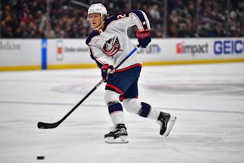 Mar 16, 2023; Los Angeles, California, USA; Columbus Blue Jackets defenseman Adam Boqvist (27) passes the puck against the Los Angeles Kings during the third period at Crypto.com Arena. Mandatory Credit: Gary A. Vasquez-USA TODAY Sports