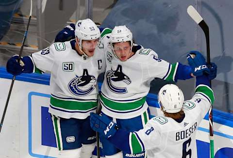 Troy Stecher #51 of the Vancouver Canucks celebrates his goal in the third period. (Photo by Jeff Vinnick/Getty Images)