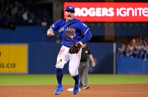 Oct 18, 2016; Toronto, Ontario, CAN; Toronto Blue Jays third baseman Josh Donaldson (20) reacts after making a play during the fifth inning against the Cleveland Indians in game four of the 2016 ALCS playoff baseball series at Rogers Centre. Mandatory Credit: Nick Turchiaro-USA TODAY Sports