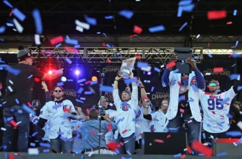 Nov 4, 2016; Chicago, IL, USA; Chicago Cubs starting pitcher Jon Lester (34) lifts the Commissioner