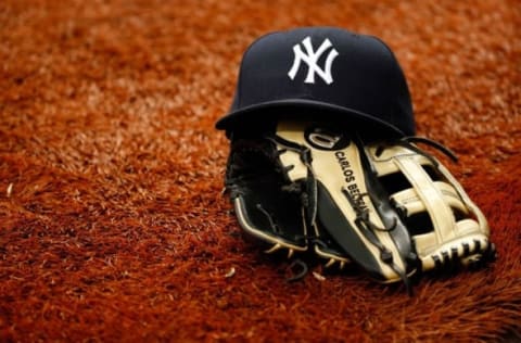 May 28, 2016; St. Petersburg, FL, USA; A detailed view of New York Yankees hat and right fielder Carlos Beltran (not pictured) glove against the Tampa Bay Rays at Tropicana Field. Mandatory Credit: Kim Klement-USA TODAY Sports