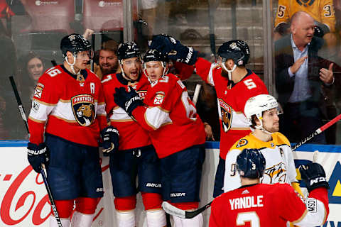 SUNRISE, FL – APRIL 3: Colton Sceviour #7 of the Florida Panthers celebrates his goal with teammates to win the game against the Nashville Predators at the BB&T Center on April 3, 2018 in Sunrise, Florida. (Photo by Eliot J. Schechter/NHLI via Getty Images) *** Local Caption *** Colton Sceviour