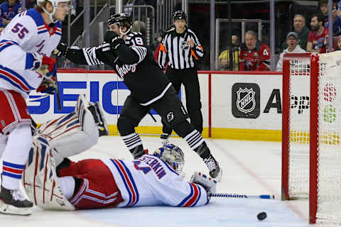 Mar 22, 2022; Newark, New Jersey, USA; New Jersey Devils center Dawson Mercer (18) celebrates after scoring a goal against New York Rangers goaltender Igor Shesterkin (31) during the second period at Prudential Center. Mandatory Credit: Tom Horak-USA TODAY Sports