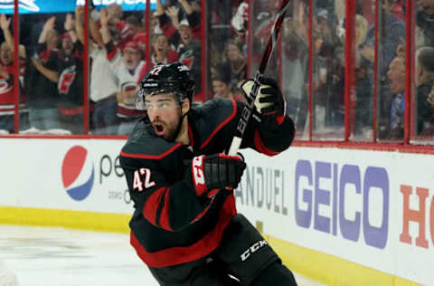 RALEIGH, NC – MAY 03: Greg McKegg #42 of the Carolina Hurricanes celebrates after scoring a goal in Game Four of the Eastern Conference Second Round against the New York Islanders during the 2019 NHL Stanley Cup Playoffs on May 3, 2019 at PNC Arena in Raleigh, North Carolina. (Photo by Gregg Forwerck/NHLI via Getty Images)