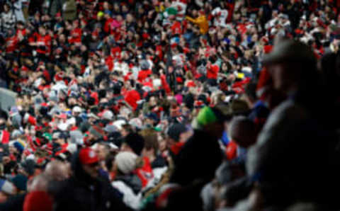 Feb 18, 2023; Raleigh, North Carolina, USA; Fans cheer in the stands during the first period of the game between the Washington Capitals and the Carolina Hurricanes during the 2023 Stadium Series ice hockey game at Carter-Finley Stadium. Mandatory Credit: Geoff Burke-USA TODAY Sports