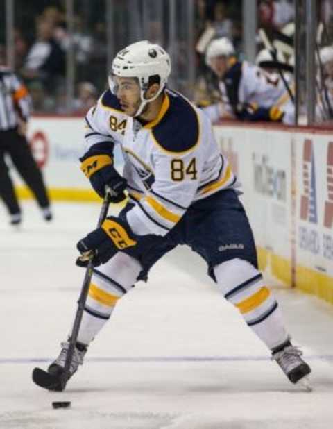 Sep 21, 2015; Saint Paul, MN, USA; Buffalo Sabres forward Phil Varone (84) against the Minnesota Wild at Xcel Energy Center. The Sabres defeated the Wild 3-2. Mandatory Credit: Brace Hemmelgarn-USA TODAY Sports