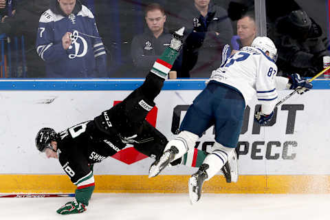 KAZAN, RUSSIA – DECEMBER 1, 2019: Ak Bars Kazan’s Vladislav Kara (L) and Dynamo Moscow’s Vadim Shipachev in a 2019/2020 KHL Regular Season ice hockey match between Ak Bars Kazan and Dynamo Moscow at Tatneft Arena. Yegor Aleyev/TASS (Photo by Yegor AleyevTASS via Getty Images)