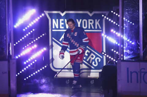 NEW YORK, NEW YORK – OCTOBER 11: Jacob Trouba #8 of the New York Rangers is introduced as the new captain of the New York Rangers prior to the game against the Tampa Bay Lightning at Madison Square Garden during the season-opening game on October 11, 2022, in New York City. (Photo by Bruce Bennett/Getty Images)