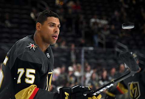 Ryan Reaves of the Vegas Golden Knights juggles a puck on his stick as he warms up before a game against the Calgary Flames at T-Mobile Arena on October 12, 2019.