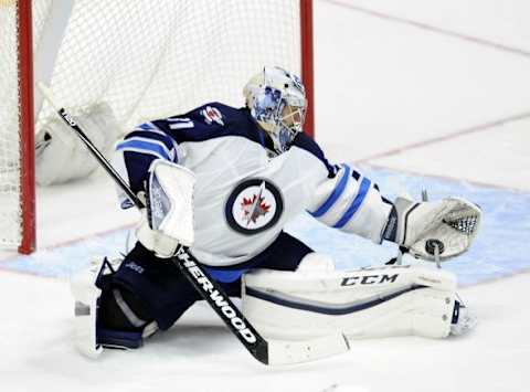 Nov 14, 2015; Nashville, TN, USA; Winnipeg Jets goalie Ondrej Pavelec (31) makes a save during the second period against the Nashville Predators at Bridgestone Arena. Mandatory Credit: Christopher Hanewinckel-USA TODAY Sports