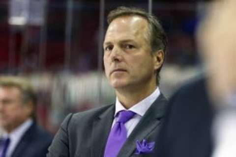 Nov 1, 2015; Raleigh, NC, USA; Tampa Bay Lightning head coach Jon Cooper looks on from the bench against the Carolina Hurricanes during the 1st period at PNC Arena. The Tampa Bay Lightning defeated the Carolina Hurricanes 4-3. Mandatory Credit: James Guillory-USA TODAY Sports