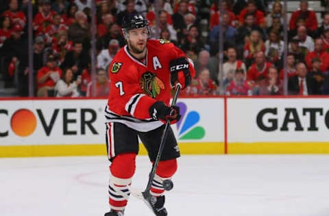 Apr 23, 2016; Chicago, IL, USA; Chicago Blackhawks defenseman Brent Seabrook (7) makes a pass during the second period in game six of the first round of the 2016 Stanley Cup Playoffs against the St. Louis Blues at the United Center. Mandatory Credit: Dennis Wierzbicki-USA TODAY Sports