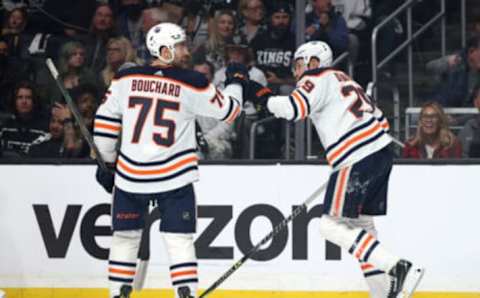 LOS ANGELES, CALIFORNIA – MAY 06: Leon Draisaitl #29 of the Edmonton Oilers celebrates his goal with Evan Bouchard #75, to take a 1-0 lead over the Los Angeles Kings, during the first period in Game Three of the First Round of the 2022 Stanley Cup Playoffs at Crypto.com Arena on May 06, 2022 in Los Angeles, California. (Photo by Harry How/Getty Images)