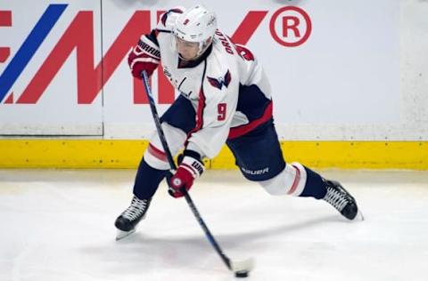 Mar 22, 2016; Ottawa, Ontario, CAN; Washington Capitals defenseman Dmitry Orlov (9) shoots the puck in the third period against the Ottawa Senators at the Canadian Tire Centre. The Capitals defeated the Senators 4-2. Mandatory Credit: Marc DesRosiers-USA TODAY Sports