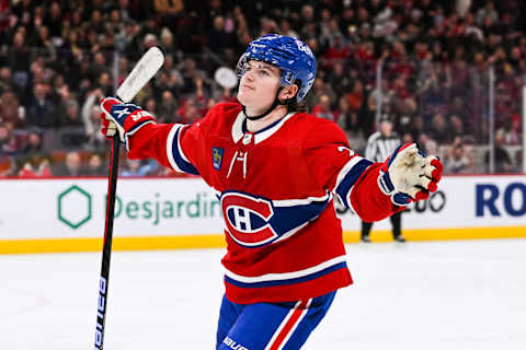 Jan 12, 2023; Montreal, Quebec, CAN; Montreal Canadiens right wing Cole Caufield (22) celebrates his goal against the Nashville Predators during the second period at Bell Centre. Mandatory Credit: David Kirouac-USA TODAY Sports