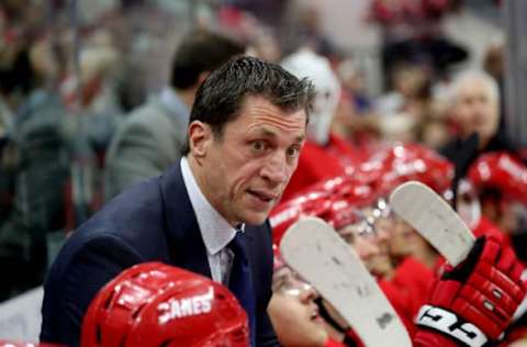 RALEIGH, NC – MARCH 28: Head coach Rod Brind’Amour of the Carolina Hurricanes draws up a play and communicates it during a timeout during an NHL game against the Washington Capitals on March 28, 2019 at PNC Arena in Raleigh, North Carolina. (Photo by Gregg Forwerck/NHLI via Getty Images)