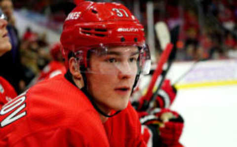 RALEIGH, NC – NOVEMBER 21:Andrei Svechnikov #37 of the Carolina Hurricanes watches action on the ice from the bench area during an NHL game against the Philadelphia Flyers on November 21, 2019 at PNC Arena in Raleigh, North Carolina. (Photo by Gregg Forwerck/NHLI via Getty Images)