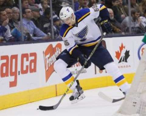 Jan 2, 2016; Toronto, Ontario, CAN; St. Louis Blues defenceman Colton Parayko (55) controls the puck against the Toronto Maple Leafs at the Air Canada Centre. Toronto defeated St. Louis 4-1. Mandatory Credit: John E. Sokolowski-USA TODAY Sports