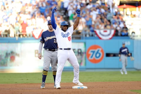 LOS ANGELES, CA – OCTOBER 15: Yasiel Puig #66 of the Los Angeles Dodgers reacts from second base after hitting a double in the second inning of Game 3 of the NLCS against the Milwaukee Brewers at Dodger Stadium on Monday, October 15, 2018 in Los Angeles, California. (Photo by Alex Trautwig/MLB Photos via Getty Images)