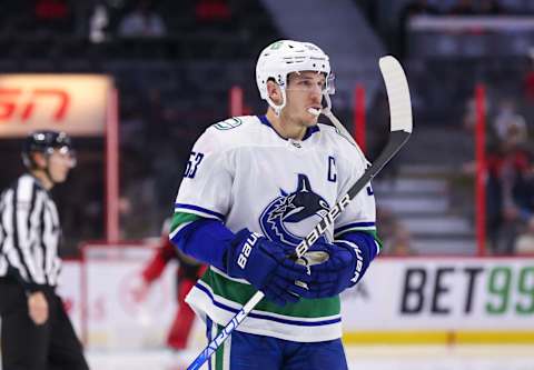 OTTAWA, ONTARIO – DECEMBER 01: Bo Horvat #53 of the Vancouver Canucks skates against the Ottawa Senators at Canadian Tire Centre on December 01, 2021, in Ottawa, Ontario. (Photo by Chris Tanouye/Getty Images)