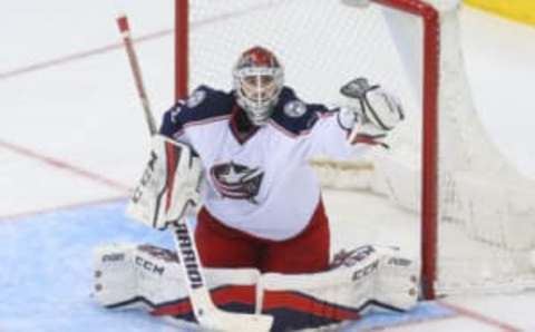 Mar 19, 2017; Newark, NJ, USA; Columbus Blue Jackets goalie Sergei Bobrovsky (72) makes a glove save during the third period at Prudential Center. The Blue Jackets defeated the Devils 4-1. Mandatory Credit: Ed Mulholland-USA TODAY Sports