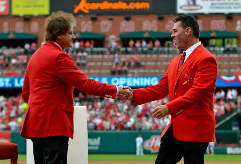 Apr 13, 2015; St. Louis, MO, USA; St. Louis Cardinals former manager Tony Larussa shakes hands with former player Jim Edmonds before the game between the St. Louis Cardinals and the Milwaukee Brewers at Busch Stadium. Mandatory Credit: Jasen Vinlove-USA TODAY Sports