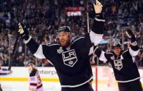 Los Angeles Kings center Jeff Carter (middle) celebrates his goal as center Anze Kopitar (right) and New Jersey Devils goalie Martin Brodeur (30) react during the second period of game six of the 2012 Stanley Cup Finals at the Staples Center. Mandatory Credit: Jayne Kamin-Oncea-USA TODAY Sports