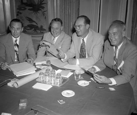 (Original Caption) This is a Baseball owners’ meeting with the Screening Committee, Phil Wrigley of the Cubs; Lou Perini of the Braves; Del Webb of the Yankees; and Ellis Ryan of Cleveland. They met at the Waldorf to determine the new Baseball Commissioner.