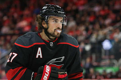 DETROIT, MI – OCTOBER 22: Carolina Hurricanes defenseman Justin Faulk (27) looks on during a regular season NHL hockey game between the Carolina Hurricanes and the Detroit Red Wings on October 22, 2018, at Little Caesars Arena in Detroit, Michigan. (Photo by Scott Grau/Icon Sportswire via Getty Images)