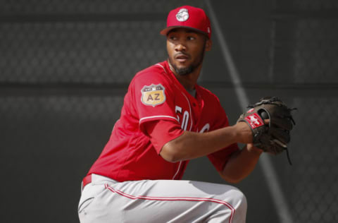 Feb 14, 2017; Goodyear, AZ, USA; Cincinnati Reds pitcher Amir Garrett (50) throws in a bullpen session at the Cincinnati Reds Spring Training Facility. Mandatory Credit: Kareem Elgazzar/Cincinnati Enquirer via USA TODAY Sports