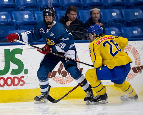 PLYMOUTH, MI – FEBRUARY 15: Montreal Canadiens (Photo by Dave Reginek/Getty Images) Jesperi Kotkaniemi; Marcus Westfalt