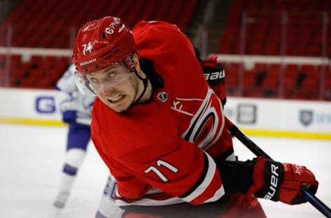 RALEIGH, NORTH CAROLINA – FEBRUARY 22: Jesper Fast #71 of the Carolina Hurricanes skates for the puck during the first period of their game against the Tampa Bay Lightning at PNC Arena on February 22, 2021, in Raleigh, North Carolina. (Photo by Jared C. Tilton/Getty Images)