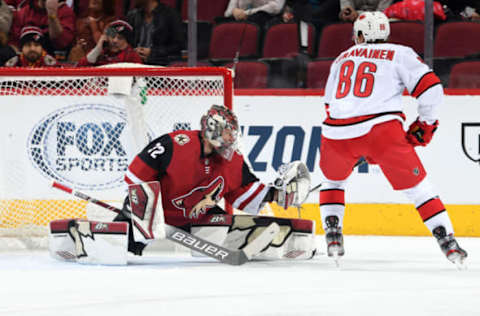 GLENDALE, ARIZONA – FEBRUARY 06: Goalie Antti Raanta #32 of the Arizona Coyotes makes a glove save on the shot attempt by Teuvo Teravainen #86 of the Carolina Hurricanes during the first period of the NHL hockey game at Gila River Arena on February 06, 2020 in Glendale, Arizona. (Photo by Norm Hall/NHLI via Getty Images)