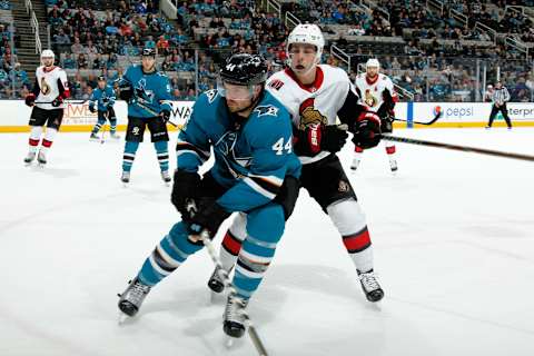 SAN JOSE, CA – DECEMBER 9: Marc-Edouard Vlasic #44 of the San Jose Sharks and Jean-Gabriel Pageau #44 of the Ottawa Senators battle in the corner at SAP Center on December 9, 2017 in San Jose, California. (Photo by Don Smith/NHLI via Getty Images)