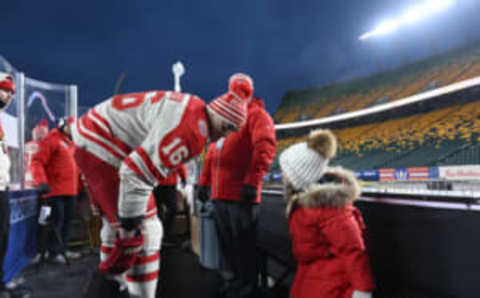 Oct 28, 2023; Edmonton, Alberta, Canada; Calgary Flames defenceman Nikita Zadorov (16) looks back towards daughter Sophie Zadorov 6 years old as the Flames hit the ice during practice day for the 2023 Heritage Classic ice hockey game at Commonwealth Stadium. Mandatory Credit: Walter Tychnowicz-USA TODAY Sports