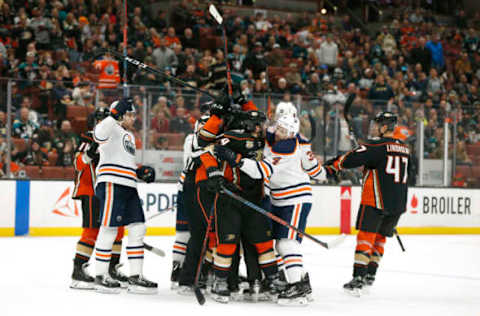 ANAHEIM, CALIFORNIA – JANUARY 06: The Anaheim Ducks and the Edmonton Oilers fight during the first period at Honda Center on January 06, 2019 in Anaheim, California. (Photo by Katharine Lotze/Getty Images)