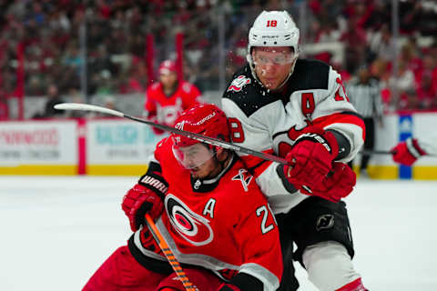 Carolina Hurricanes center Sebastian Aho and New Jersey Devils wing Ondrej Palat: James Guillory-USA TODAY Sports