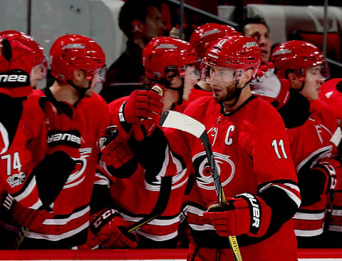 RALEIGH, NC – OCTOBER 29: Jordan Staal #11 of the Carolina Hurricanes scores a goal and celebrates with teammates during an NHL game against the Anaheim Ducks on October 29, 2017 at PNC Arena in Raleigh, North Carolina. (Photo by Gregg Forwerck/NHLI via Getty Images)