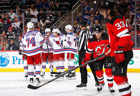 The New York Rangers celebrate a third-period goal by Artemi Panarin #10 against the New Jersey Devils (Photo by Bruce Bennett/Getty Images)