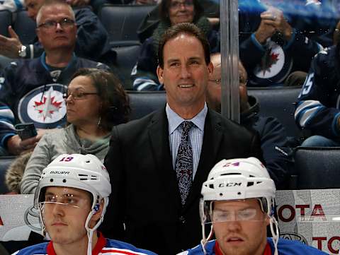 WINNIPEG, MB – DECEMBER 8: Assistant Coach Scott Arniel of the New York Rangers looks on from the bench prior to puck drop against the Winnipeg Jets at the MTS Centre on December 8, 2016 in Winnipeg, Manitoba, Canada. (Photo by Jonathan Kozub/NHLI via Getty Images)