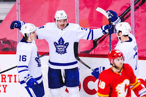 CALGARY, AB – APRIL 4: (L-R) Mitch Marner #16, Auston Matthews #34 and T.J. Brodie #78 of the Toronto Maple Leafs  a. (Photo by Derek Leung/Getty Images)