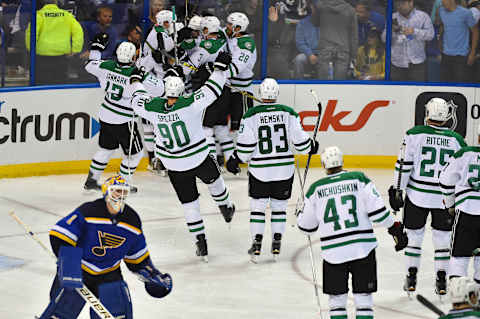 May 5, 2016; St. Louis, MO, USA; Dallas Stars teammates celebrate defeating the St. Louis Blues 3-2 in game four of the second round of the 2016 Stanley Cup Playoffs at Scottrade Center. Mandatory Credit: Jasen Vinlove-USA TODAY Sports