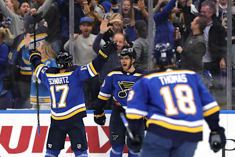 ST LOUIS, MISSOURI – MAY 21: Brayden Schenn #10 of the St. Louis Blues celebrates with Jaden Schwartz #17 and Robert Thomas #18 after scoring a goal on Martin Jones #31 of the San Jose Sharks during the second period in Game Six of the Western Conference Finals during the 2019 NHL Stanley Cup Playoffs at Enterprise Center on May 21, 2019 in St Louis, Missouri. (Photo by Elsa/Getty Images)