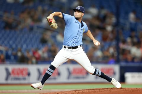 Aug 24, 2022; St. Petersburg, Florida, USA; Tampa Bay Rays starting pitcher Shane McClanahan (18) throws a pitch against the Los Angeles Angels in the first inning at Tropicana Field. Mandatory Credit: Nathan Ray Seebeck-USA TODAY Sports