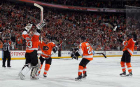 Brian Boucher, Daniel Briere, Matt Carle, and Scott Hartnell, Philadelphia Flyers (Photo by Jim McIsaac/Getty Images)