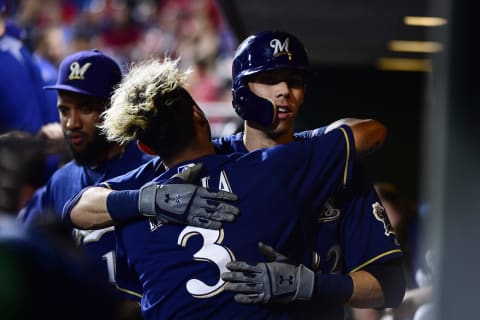 PHILADELPHIA, PA – JUNE 08: Christian Yellich #22 of the Milwaukee Brewers is hugged by teammate Orlando Arrcia # (Photo by Corey Perrine/Getty Images)