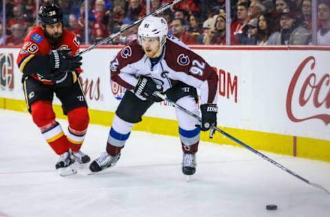 NHL Trade Deadline: Colorado Avalanche left wing Gabriel Landeskog (92) and Calgary Flames defenseman Deryk Engelland (29) battle for the puck during the second period at Scotiabank Saddledome. Mandatory Credit: Sergei Belski-USA TODAY Sports